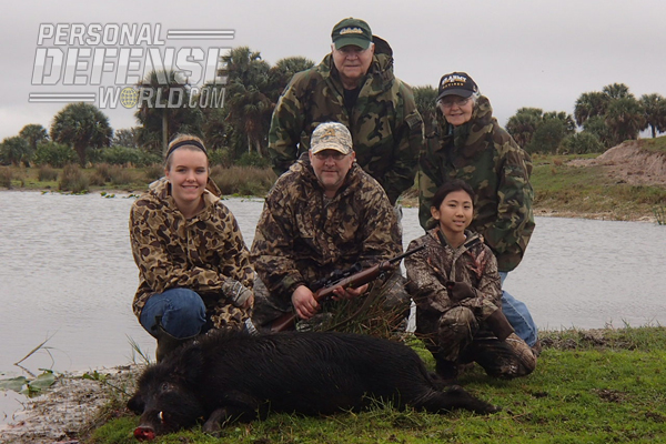 Front row (l-r), author Olivia Vigna with her second boar; John Vigna (father); Sophie Vigna (sister), who took her first boar on this particular trip; and the grandparents Al and Barbara in the back row.
