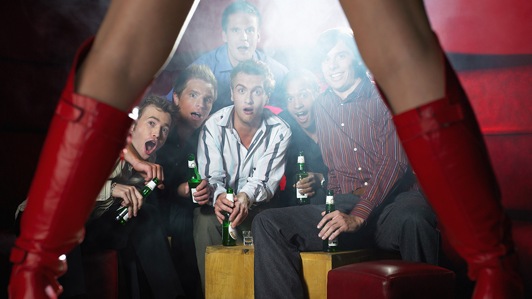 Bachelor Party crew at a strip club.