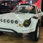 A fully built Porsche rally race car.